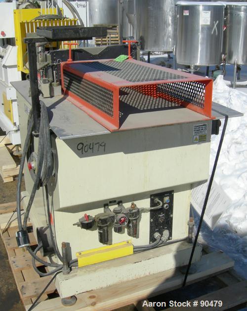 USED: Conair traveling cut off saw, model MST-6. Upacting saw blade. Approximate 32" x 52" traveling table. Top air operated hold down. Driven by an approximate 3 hp motor. Includes a dust collector ...