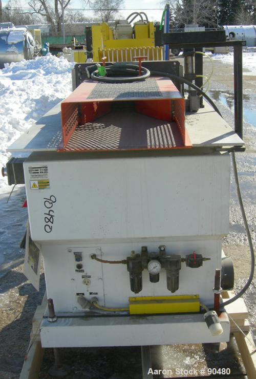 USED: Conair traveling cut off saw, model MST-6. Upacting saw blade. Approximate 32" x 52" traveling table. Top air operated hold down. Driven by an approximate 3 hp motor. Includes a dust collector ...