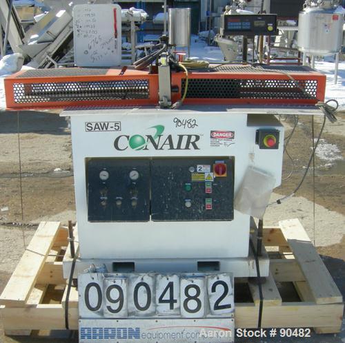 USED: Conair traveling cut off saw, model MST-6. Upacting saw blade. Approximate 32" x 52" traveling table. Top air operated hold down. Driven by an approximate 3 hp motor. Includes a dust collector ...