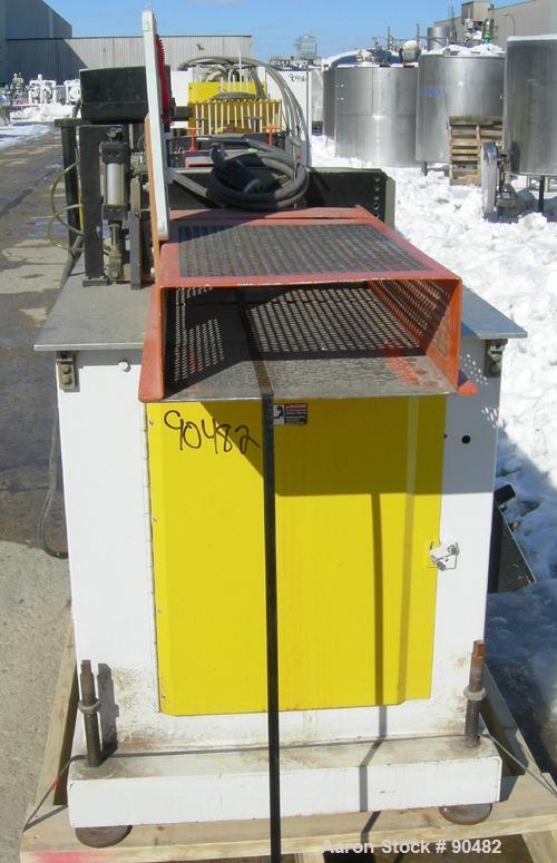 USED: Conair traveling cut off saw, model MST-6. Upacting saw blade. Approximate 32" x 52" traveling table. Top air operated hold down. Driven by an approximate 3 hp motor. Includes a dust collector ...