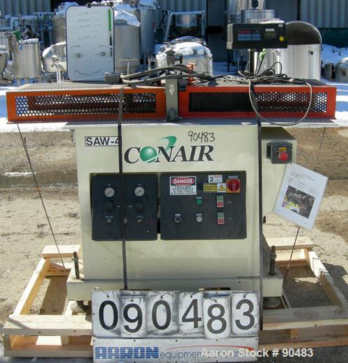 USED: Conair traveling cut off saw, model MST-6. Upacting saw blade. Approximate 32" x 52" traveling table. Top air operated hold down. Driven by an approximate 3 hp motor. Includes a dust collector ...