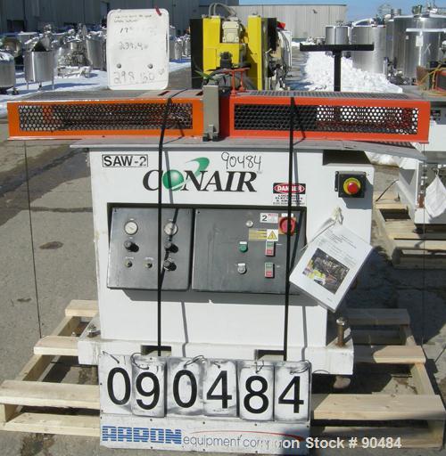 USED: Conair traveling cut off saw, model MST-6. Upacting saw blade. Approximate 32" x 52" traveling table. Top air operated hold down. Driven by an approximate 3 hp motor. Includes a dust collector ...