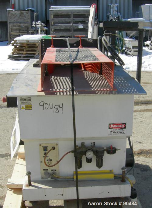 USED: Conair traveling cut off saw, model MST-6. Upacting saw blade. Approximate 32" x 52" traveling table. Top air operated hold down. Driven by an approximate 3 hp motor. Includes a dust collector ...