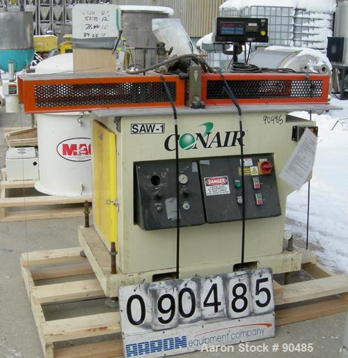USED: Conair traveling cut off saw, model MST-6. Upacting saw blade. Approximate 32" x 52" traveling table. Top air operated hold down. Driven by an approximate 3 hp motor. Includes a dust collector ...
