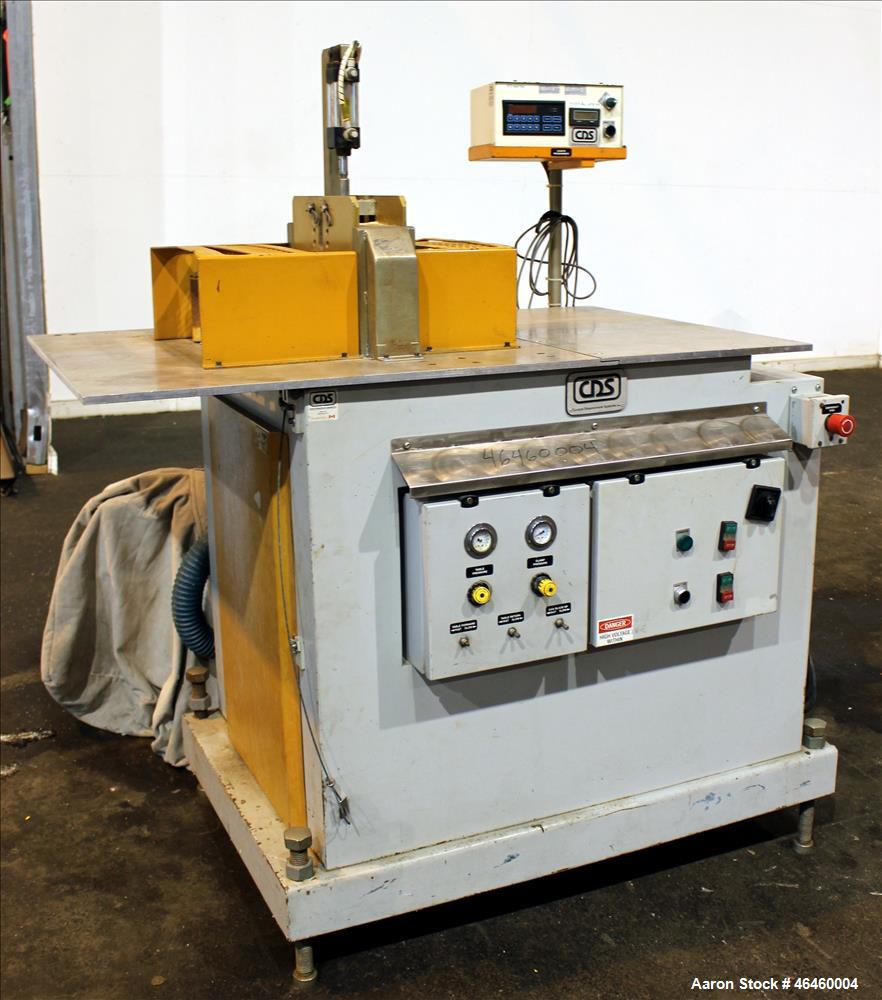 Used CDS Traveling Cut-off Saw, Model CTS 6.5-13D. Up acting blade, 18" AC traveling table. Top hold down. Profile cut cross section 3.5" high x 13" wide. Maximum O.D. 6.7". Blade rpm 2156. Blade dri...