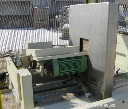 Used: Extrusion Services Inc. traveling saw, model Servo Boost. Approximately 16" diameter down acting blade, driven by a 3hp,3/60/230/460 volt, 3500 rpm motor.