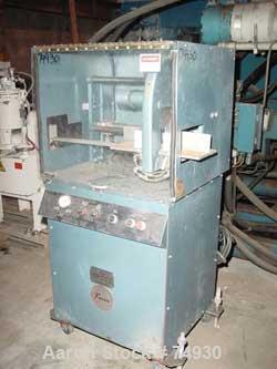 USED: Farris universal automatic travelling saw, model R31/2.12" diameter blade, pneumatically operated downstroke and carriagespeed. Blade driven by an approx 3/4 hp motor.