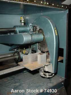 USED: Farris universal automatic travelling saw, model R31/2.12" diameter blade, pneumatically operated downstroke and carriagespeed. Blade driven by an approx 3/4 hp motor.