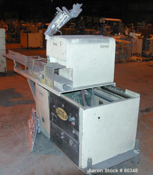 USED: Gatto table saw, model CS.7.24. Unit can accept up to 4" wide x 2" tall or 2" diameter product. Saw driven by 3 hp 3/60/208-230/460 volt, 1725 rpm motor, 2 pneumatic product guides. Unit requir...