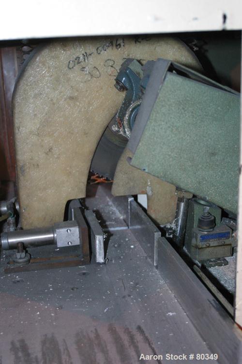 USED: Gatto table saw, model HS.2.4, 12" diameter saw blade. Unit can accept up to 4" wide x 2" tall or 2" diameter product. Saw driven by 2 hp motor, 2 pneumatic product guides.