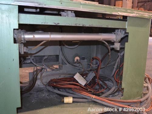 Used Gatto Traveling Center Arm Saw, Model OPS-7-24. 20 Diameter blade, 24 table travel, 7 O.D. capacity, maximum 12 cuts per minute. Driven by a 3hp, 3/60/208-230/460 volt, 1725 rpm motor. Mounted o...