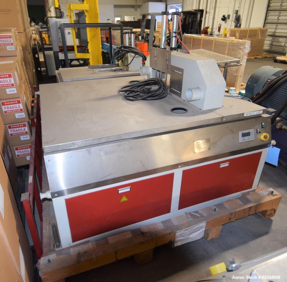 Used JWell Extrusion Machinery Upacting Traveling Cut Off Saw. Cutting range 0-400mm, table approximate 1900mm x 1700mm, with hold-down. Serial# MP1411/174.