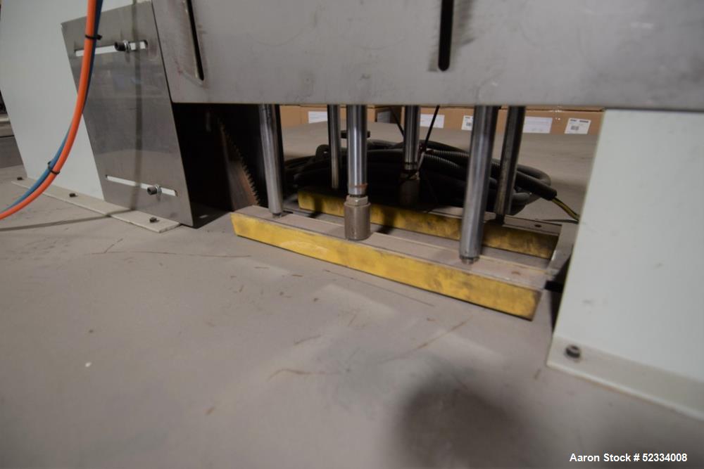 Used JWell Extrusion Machinery Upacting Traveling Cut Off Saw. Cutting range 0-400mm, table approximate 1900mm x 1700mm, with hold-down. Serial# MP1411/174.