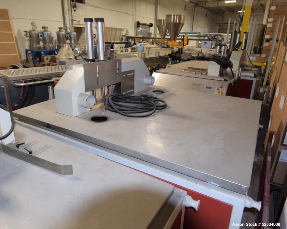 Used JWell Extrusion Machinery Upacting Traveling Cut Off Saw. Cutting range 0-400mm, table approximate 1900mm x 1700mm, with hold-down. Serial# MP1411/174.