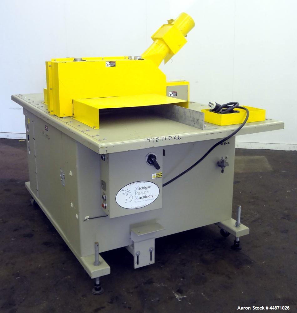 Used- Michigan Plastics Machinery Traveling Chop-Cut Saw.  Blade driven by a 1.5 hp, 3/60/208-230/460 volt, 3500 rpm motor. ...