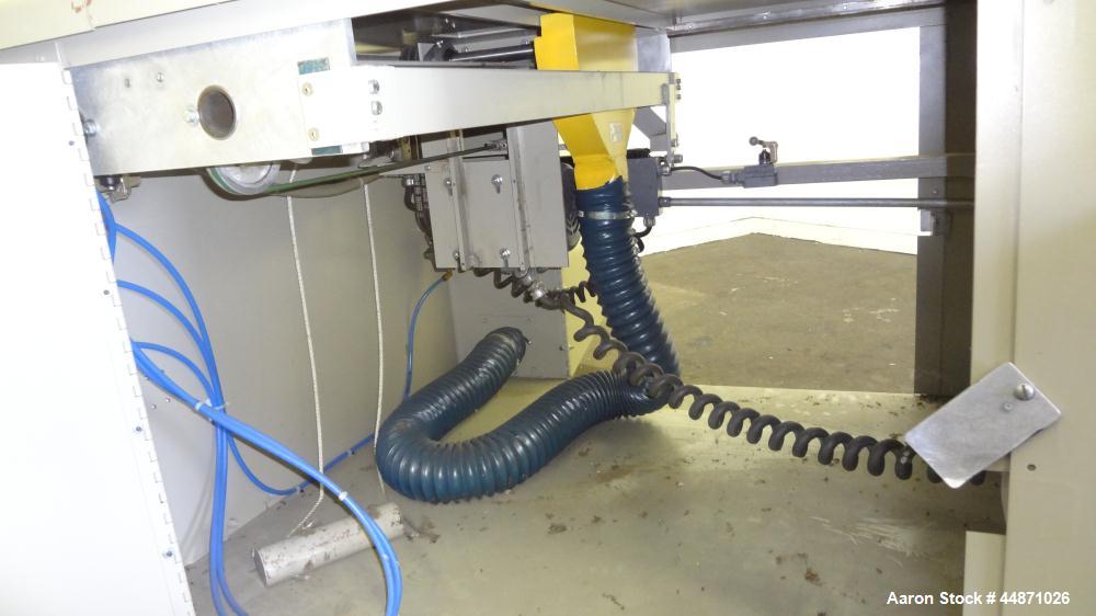 Used Michigan Plastics Machinery Traveling Chop-Cut Saw.  Blade driven by a 1.5 hp, 3/60/208-230/460 volt, 3500 rpm motor.  Mounted on a base with adjustable legs.  No manufacturer's tag.