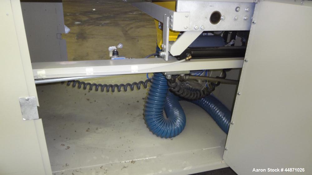 Used Michigan Plastics Machinery Traveling Chop-Cut Saw.  Blade driven by a 1.5 hp, 3/60/208-230/460 volt, 3500 rpm motor.  Mounted on a base with adjustable legs.  No manufacturer's tag.
