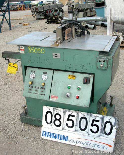 Used Metaplast Air Traveling Cut Off Saw, Model MST-4. 12" Diameter up acting blade. Traveling table. Top air operated hold down. Driven by an approximately 3 hp motor.
