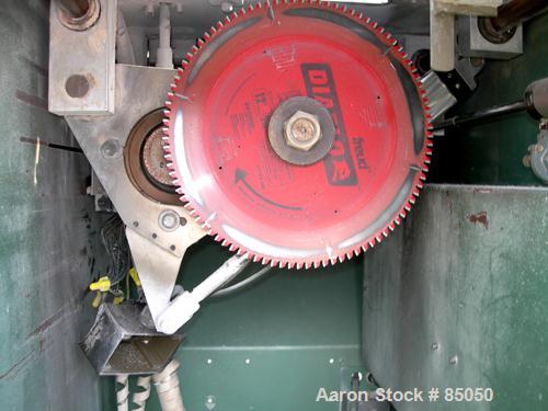 Used Metaplast Air Traveling Cut Off Saw, Model MST-4. 12" Diameter up acting blade. Traveling table. Top air operated hold down. Driven by an approximately 3 hp motor.