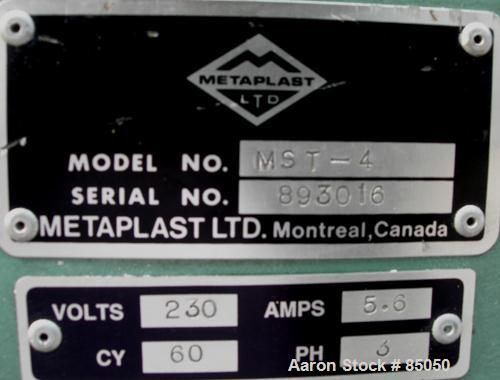 Used Metaplast Air Traveling Cut Off Saw, Model MST-4. 12" Diameter up acting blade. Traveling table. Top air operated hold down. Driven by an approximately 3 hp motor.