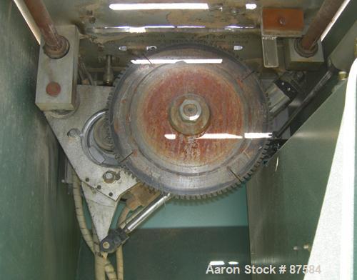 Used Metaplast Air Traveling Cut Off Saw, Model MST-4. 12" Diameter up acting blade, traveling table. Top air operated hold down. Driven by an approximate 3 hp, 575 volt motor.