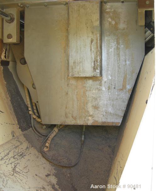 USED: Metaplas traveling cut off saw, model MST-6. Upacting saw blade. Approximate 32" x 52" traveling table. Top air operated hold down. Driven by an approximate 3 hp motor. Includes a dust collecto...