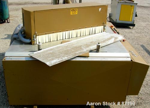 Used Royal Upacting Traveling Rotary Miter Saw, Model 384. Pneumatic hold down. Driven by a 6.6 HP, 3/60/460 Volt motor. Built 2001.
