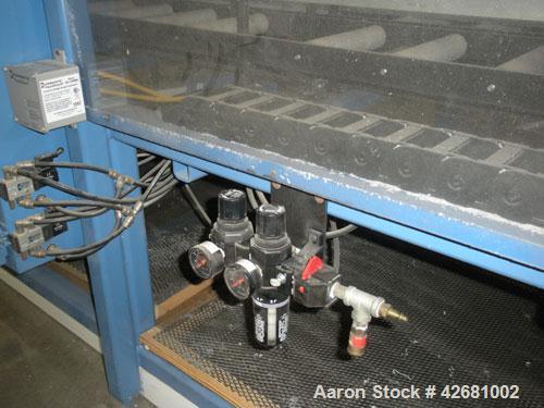Used SSD Technology CNC Router, Model PRO-2000.  58 Inches per second, 100 inches per second ACC.  120" Long cutting capability, (4) 8" x 8" bays, zero load time, self-centering material clamps, intu...