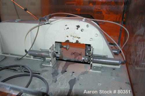 USED: Sakas table saw, model SP8. 24" diameter saw blade. Unit can accept up to 7" wide x 6" tall product. Saw driven by 5 hp motor.