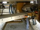 Used Royal Upacting Traveling Rotary Miter Saw, Model 384. Pneumatic hold down. Driven by a 6.6 HP, 3/60/460 Volt motor. Built 2001.