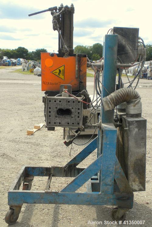 Used 6'' Hydraulic Screen Changer. Last used on an approximate 63 mm twin screw extruder. Includes a 7.5 kW, 3/50/220/380 volt, 1450 rpm hydraulic power pack. Screen changer mounted on a carbon steel...
