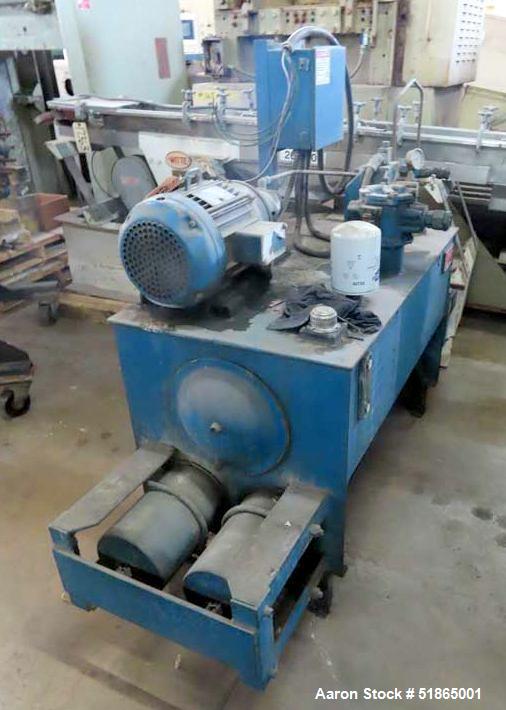 Used- Beringer Model 1200 Slide Plate Screen Changer. (2) Nominal 12" diameter breaker plates. Unit is mounted on a stand wi...