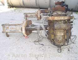 Used Beringer 15" Diameter Hydraulically Operated Screen Changer, Model 1500. Unit is equipped with a mechanically operated adjustment for seal that is belt driven (missing motor). Hydraulic power un...