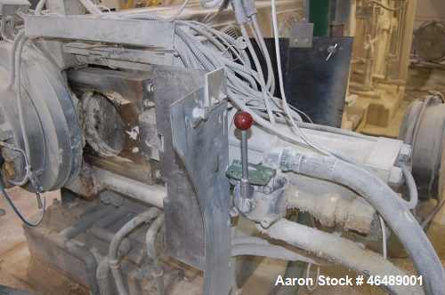 Used Beringer Slide Plate Screen Changer. Previously used on a 10" hot feed extruder. Includes hydraulic pumping system.