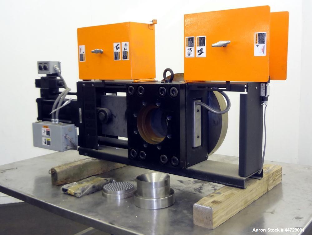 Unused- Dynisco 6" Hydraulic Slide Plate Screen Changer, Model EH-60.  Horizontal opposite mounting postion. Body heater 8000 watts, slide plate heater 1600 watts, line voltage 480.  Includes a break...