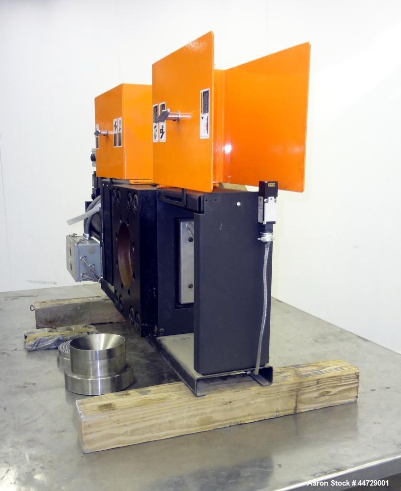 Unused- Dynisco 6" Hydraulic Slide Plate Screen Changer, Model EH-60.  Horizontal opposite mounting postion. Body heater 8000 watts, slide plate heater 1600 watts, line voltage 480.  Includes a break...