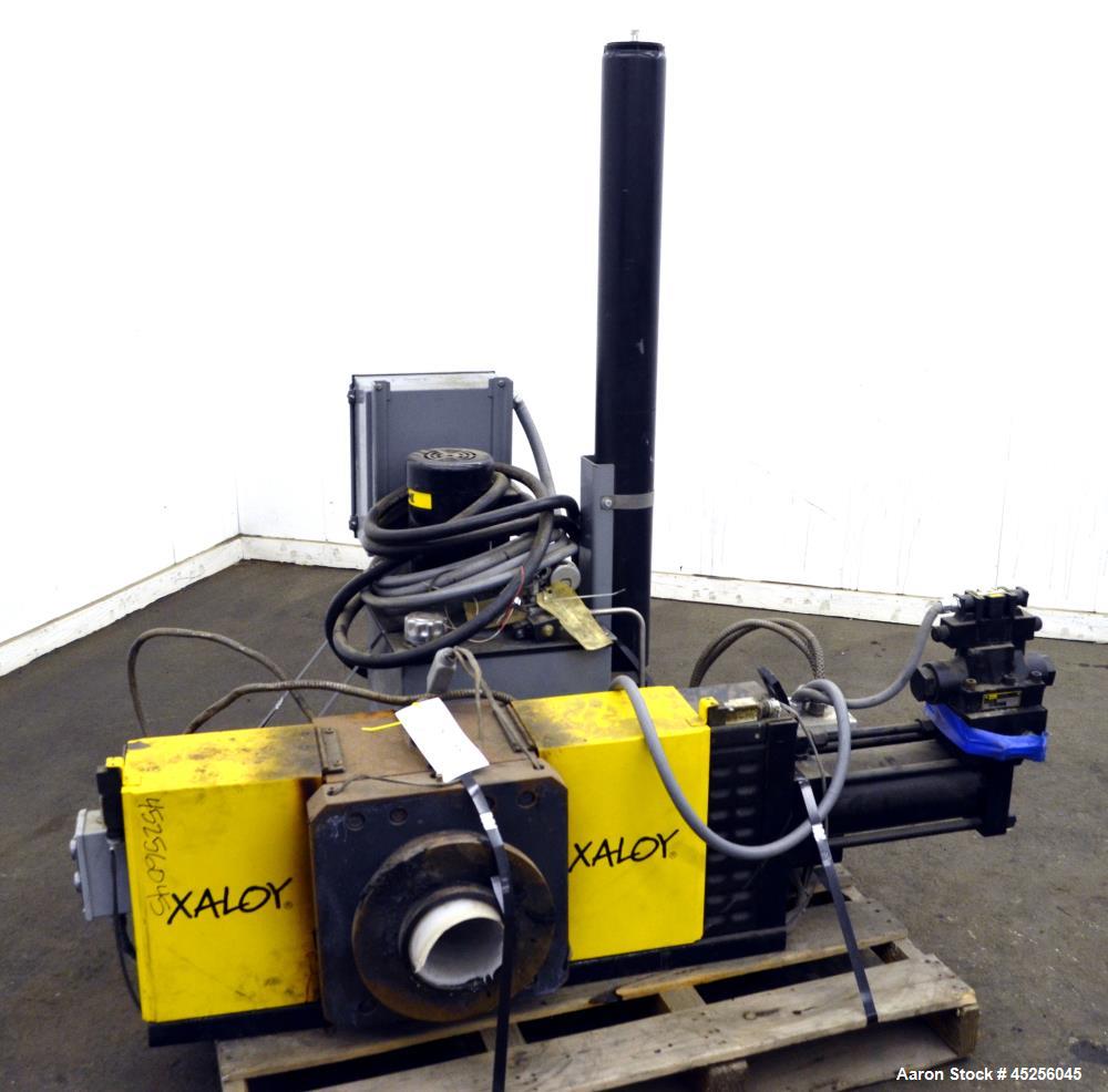 Used Dynisco Xaloy 6" Hydraulic Screen Changer, Model EH-60. Includes a 2hp power pack. Serial# EH60773.