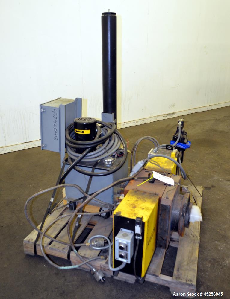 Used Dynisco Xaloy 6" Hydraulic Screen Changer, Model EH-60. Includes a 2hp power pack. Serial# EH60773.