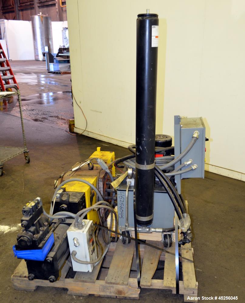 Used Dynisco Xaloy 6" Hydraulic Screen Changer, Model EH-60. Includes a 2hp power pack. Serial# EH60773.