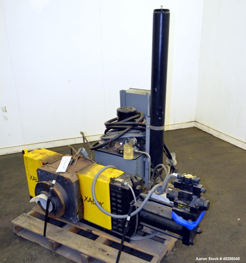 Used Dynisco Xaloy 6" Hydraulic Screen Changer, Model EH-60. Includes a 2hp power pack. Serial# EH60773.