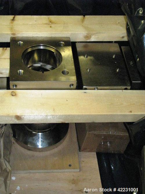 Used Hi-Tech Continuous Screen Changer, model E07R-XL, fully automatic. Includes time cycle based screen feed controls, upstream adapter, 120' roll of 72/15-P mesh screen. Manufactured 2006.