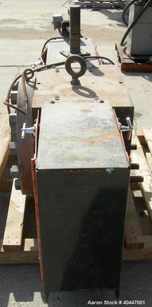 Used Extek model HSC-1000 hydraulically operated 10" screen changer. Slide plate design. Includes breaker plate. Also includes hydraulic power unit, dual accumulator, 5hp tank mounted motor.