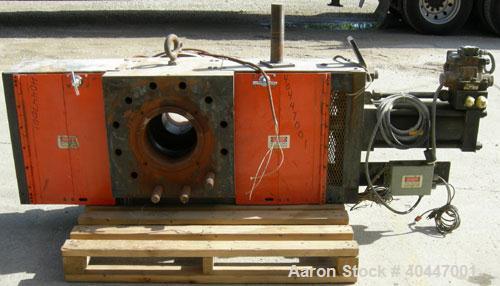 Used Extek model HSC-1000 hydraulically operated 10" screen changer. Slide plate design. Includes breaker plate. Also includes hydraulic power unit, dual accumulator, 5hp tank mounted motor.