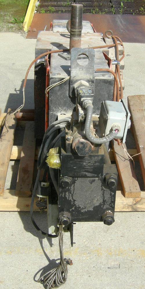 Used Extek model HSC-1000 hydraulically operated 10" screen changer. Slide plate design. Includes breaker plate. Also includes hydraulic power unit, dual accumulator, 5hp tank mounted motor.