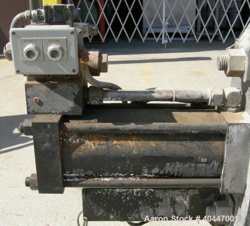Used Extek model HSC-1000 hydraulically operated 10" screen changer. Slide plate design. Includes breaker plate. Also includes hydraulic power unit, dual accumulator, 5hp tank mounted motor.