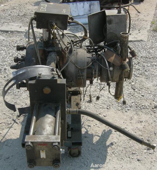 USED: MGB 6" hydraulic screen changer, model 6000. Mounted on a frame with casters. No power pack.