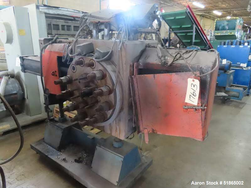 Used MGB Model SC12 Slide Plate Screen Changer. (2) Nominal 12" diameter breaker plates. Unit is mounted on a  stand with casters supplying approximately a  42? discharge height. Package includes a 1...