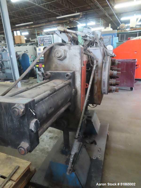 Used MGB Model SC12 Slide Plate Screen Changer. (2) Nominal 12" diameter breaker plates. Unit is mounted on a  stand with casters supplying approximately a  42? discharge height. Package includes a 1...