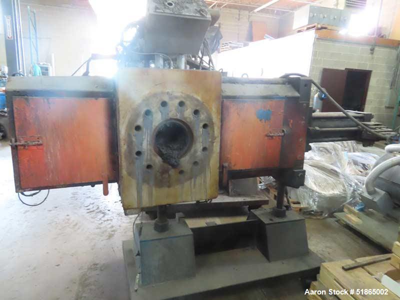 Used MGB Model SC12 Slide Plate Screen Changer. (2) Nominal 12" diameter breaker plates. Unit is mounted on a  stand with casters supplying approximately a  42? discharge height. Package includes a 1...