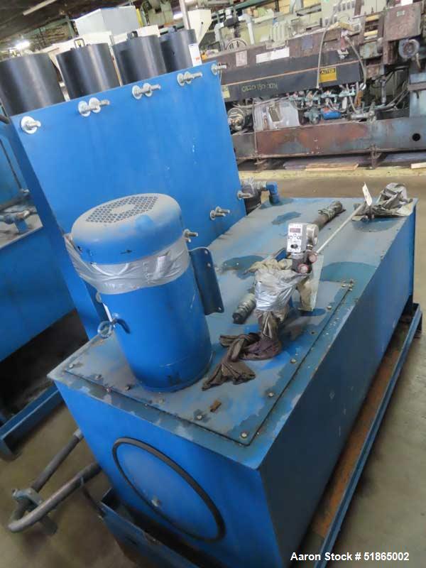 Used MGB Model SC12 Slide Plate Screen Changer. (2) Nominal 12" diameter breaker plates. Unit is mounted on a  stand with casters supplying approximately a  42? discharge height. Package includes a 1...